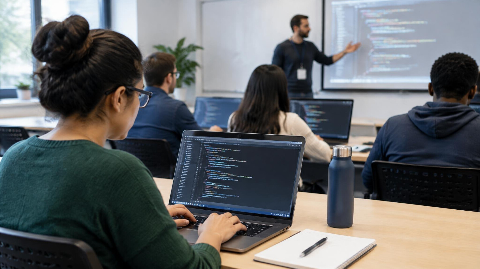 adult students learning coding