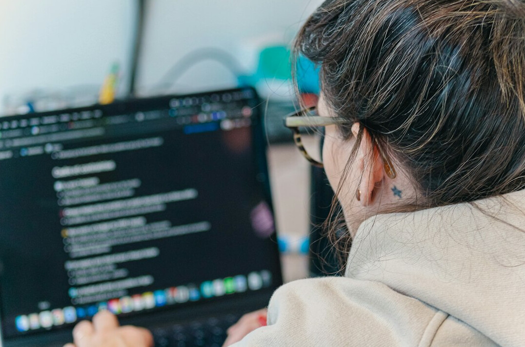 group of adults in coding class